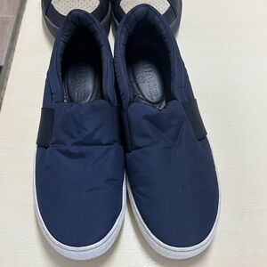 CHANEL Navy Blue Quilted Slip-On Loafers with White Soles